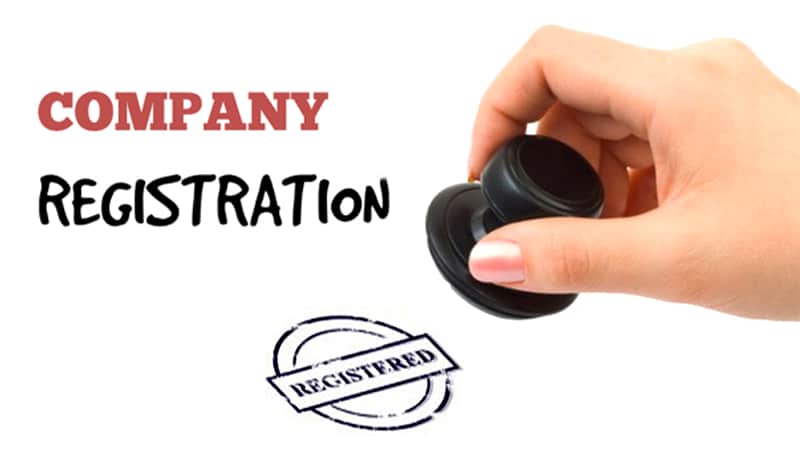 a hand is placing confirmation stemp on company registration